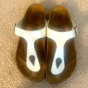 Gold metallic between toe sandal size 36